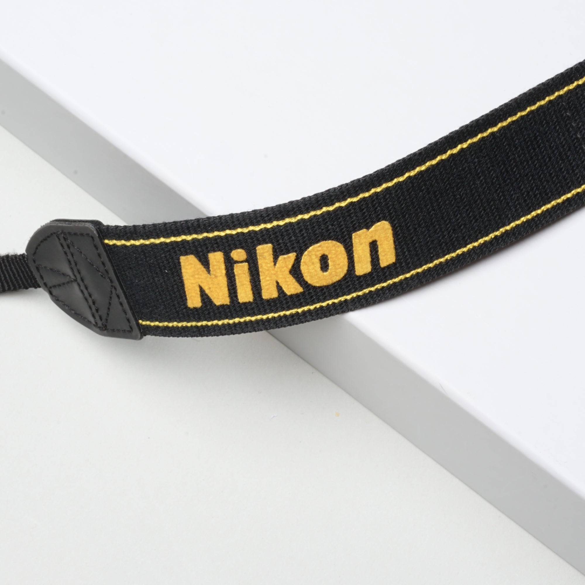 Buy Nikon original strap black now at Analogue Amsterdam